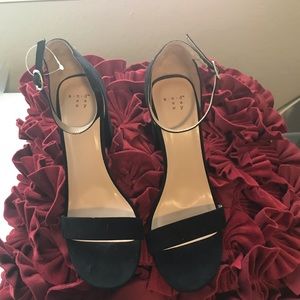 Cute woman’s black dress sandals